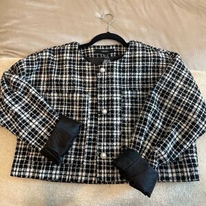 Black and white cropped jacket with pearl buttons